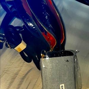 Brand new backpack with an integrated wallet.